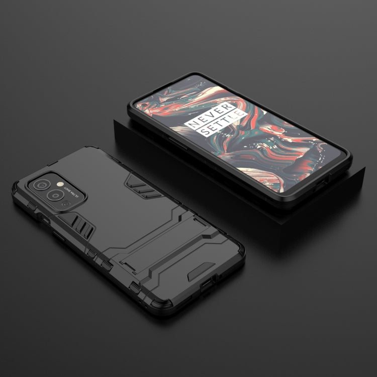 PC + TPU Shockproof Protective Case with Holder, For OnePlus 9, For OPPO Reno5, For Xiaomi Redmi Note 9 5G