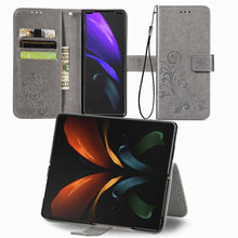 Load image into Gallery viewer, Four-leaf Clasp Embossed Buckle Mobile Phone Protection Leather Case with Lanyard &amp; Card Slot &amp; Wallet &amp; Bracket Function, For Samsung Galaxy Z Fold3 5G