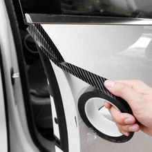 Load image into Gallery viewer, Universal Car Carbon Fiber Door Anti-collision Strip Protection Guards Trims Stickers Tape, 3cm x 3m, 3cm x 5m, 3cm x 10m, 5cm x 3m, 5cm x 5m, 5cm x 10m, 7cm x 3m, 7cm x 5m, 7cm x 10m, 10cm x 3m, 10cm x 5m, 10cm x 10m
