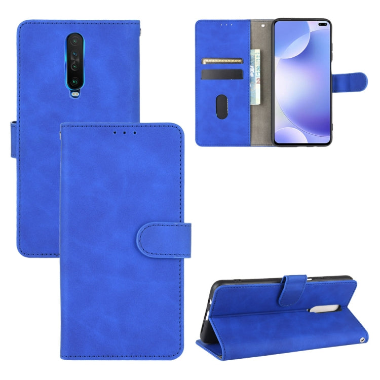 Solid Color Skin Feel Magnetic Buckle Horizontal Flip Calf Texture PU Leather Case with Holder & Card Slots & Wallet