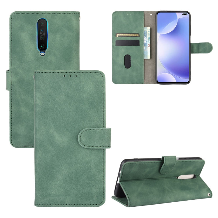 Solid Color Skin Feel Magnetic Buckle Horizontal Flip Calf Texture PU Leather Case with Holder & Card Slots & Wallet