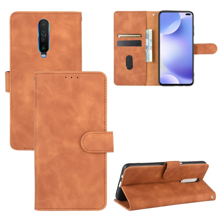 Solid Color Skin Feel Magnetic Buckle Horizontal Flip Calf Texture PU Leather Case with Holder & Card Slots & Wallet