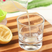 Load image into Gallery viewer, Multi-function Manual Mini Lemon Juicer with a Graduation Cup Juicer