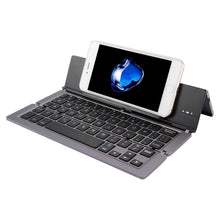 Load image into Gallery viewer, F18 Ultra-slim Rechargeable Foldable 58 Keys Bluetooth Wireless Keyboard with Holder