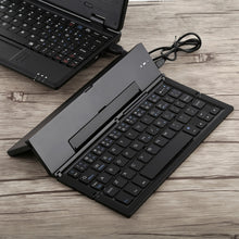 Load image into Gallery viewer, GK608 Ultra-thin Foldable Bluetooth V3.0 Keyboard, Built-in Holder, Support Android / iOS / Windows System, GK608 (Black), GK608 (Grey), GK608 (Gold)