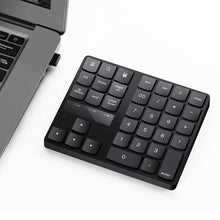 Load image into Gallery viewer, 2.4G USB Wireless Numeric Keypad 35 Keys Charging Digital Keyboard Notebook Laptop Mini Numpad