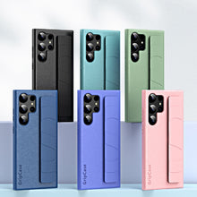 Load image into Gallery viewer, Skin Elastic Wrist Grip Back Cover Phone Case, For Samsung Galaxy S25 5G, For Samsung Galaxy S25+ 5G, For Samsung Galaxy S25 Ultra 5G, For Samsung Galaxy S24 Ultra 5G, For Samsung Galaxy S24+ 5G, For Samsung Galaxy S24 5G, For Samsung Galaxy S23 Ultra ...