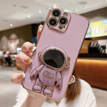 Load image into Gallery viewer, Electroplating Astronaut Holder Phone Case, For iPhone 17e / 16e, For iPhone 17 Pro Max, For iPhone 17 Pro, For iPhone 17, For iPhone Air, For iPhone 16 Pro Max, For iPhone 16 Pro, For iPhone 16 Plus