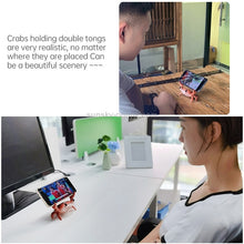 Load image into Gallery viewer, Weightlifting Crab Mobile Phone Stand Desktop Bluetooth Speaker Pen Holder Eye Stand Lazy Mobile Phone Stand