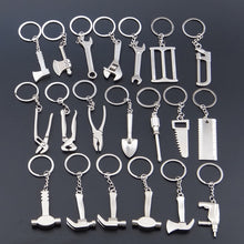 Load image into Gallery viewer, 10 PCS Tool Metal Keychain Car Key Ring Pendant, H-540 Activity Wrench, H-389 Hex Wrench, H-391 Glossy Ax, H-388 Thread Ax, H-395 Double Head Wrench, H-405 Double Row Saw, H-402 Hand Saw, H-541 Crooked Nose Pliers, H-399 Pliers, X-396 Vise, H-556 Shove...
