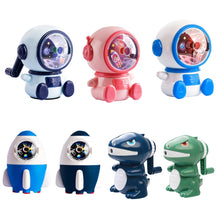 Load image into Gallery viewer, Cartoon Hand-cranked Automatic Pencil Sharpener, Style:, Astronaut (Dark Blue), Astronaut (Light Blue), Astronaut (Pink), Little Rocket (Sky Blue), Little Rocket (Deep Sea Blue), Little Dinosaur (Dark Blue), Little Dinosaur (Lauret Green)