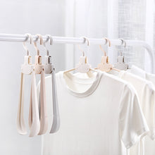 Load image into Gallery viewer, Plastic Travel Folding Hanger Portable Clothes Wide Shoulder Traceless Drying Rack