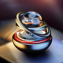 Load image into Gallery viewer, Interstellar Vast Solar Rotating Car Aromatherapy Ornaments, Black, Red, Gold, Silver