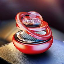 Load image into Gallery viewer, Interstellar Vast Solar Rotating Car Aromatherapy Ornaments, Black, Red, Gold, Silver