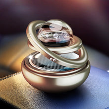 Load image into Gallery viewer, Interstellar Vast Solar Rotating Car Aromatherapy Ornaments, Black, Red, Gold, Silver