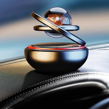 Load image into Gallery viewer, Interstellar Vast Solar Rotating Car Aromatherapy Ornaments, Black, Red, Gold, Silver