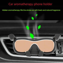 Load image into Gallery viewer, Car Air Conditioning Outlet Aromatherapy Gravity Mobile Phone Holder