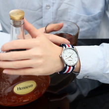 Load image into Gallery viewer, CAGARNY 6865 Concise Style Ultra Thin Waterproof Quartz Wrist Watch with Striped Nylon Band